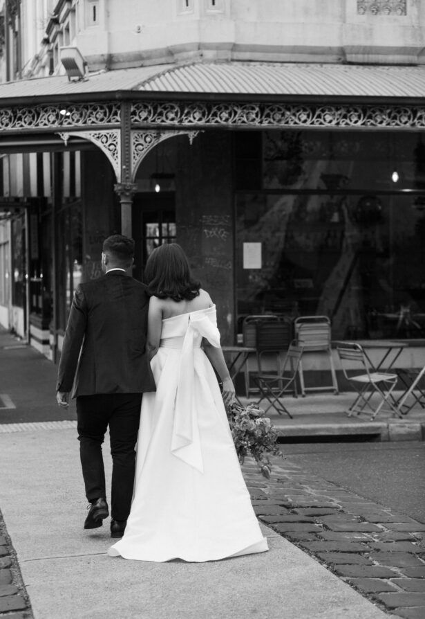 Bride and groom walking.